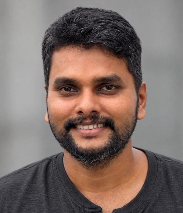 Harikrishnan, web designer and developer, working on a website design